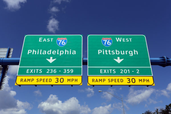 An interstate sign in Pennsylvania gives drivers the choice of driving to Philadelphia or Pittsburgh.